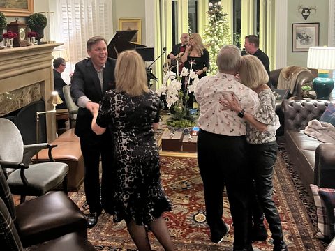 Guests dancing to a jazz combo at a private party